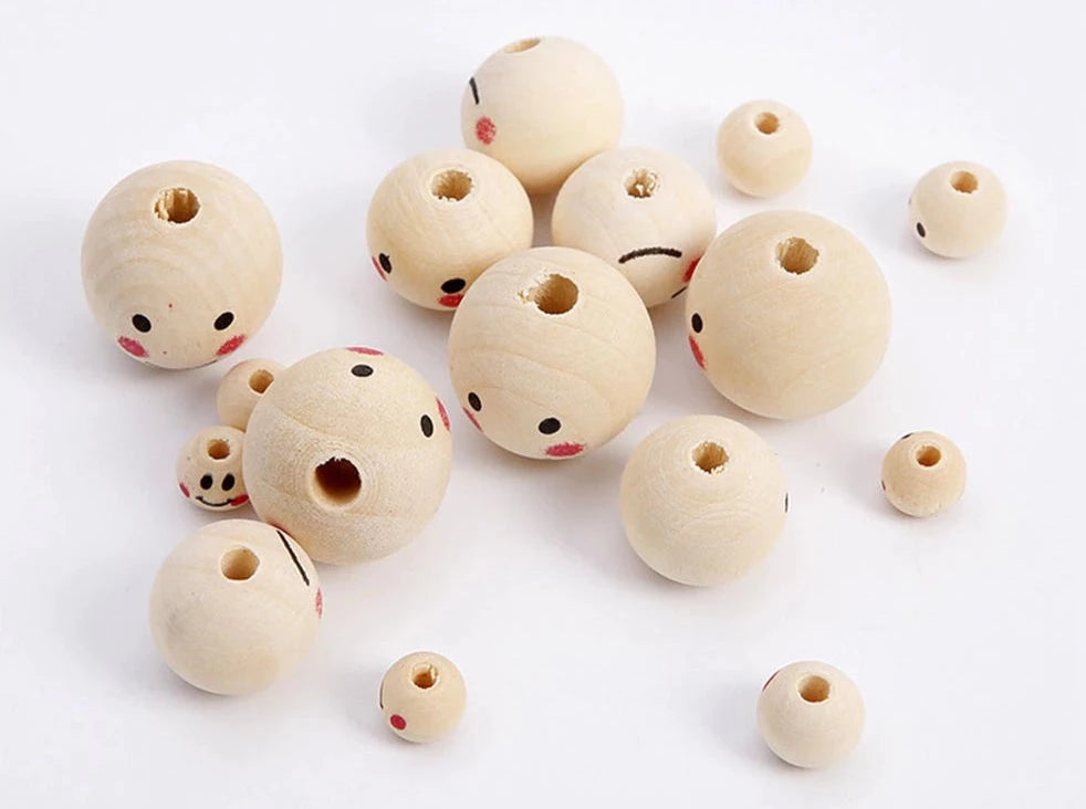 Perlen - Köpfe aus Holz